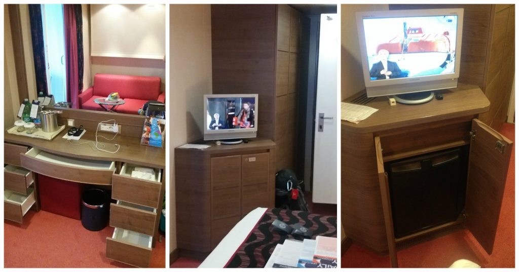 Drawer space and mini bar fridge with TV in balcony cabin 12116 on MSC Poesia