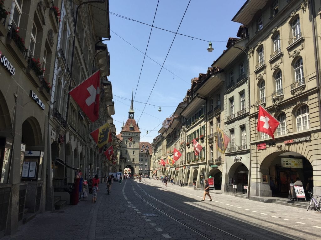 Bern city with the Coat of Arms & Swiss flags flying